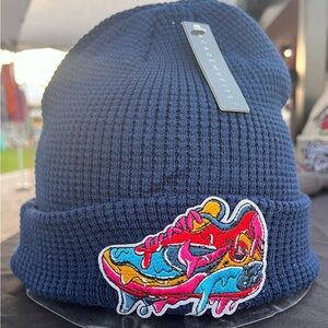 Blue beanie with dripping NIKE sneaker patch